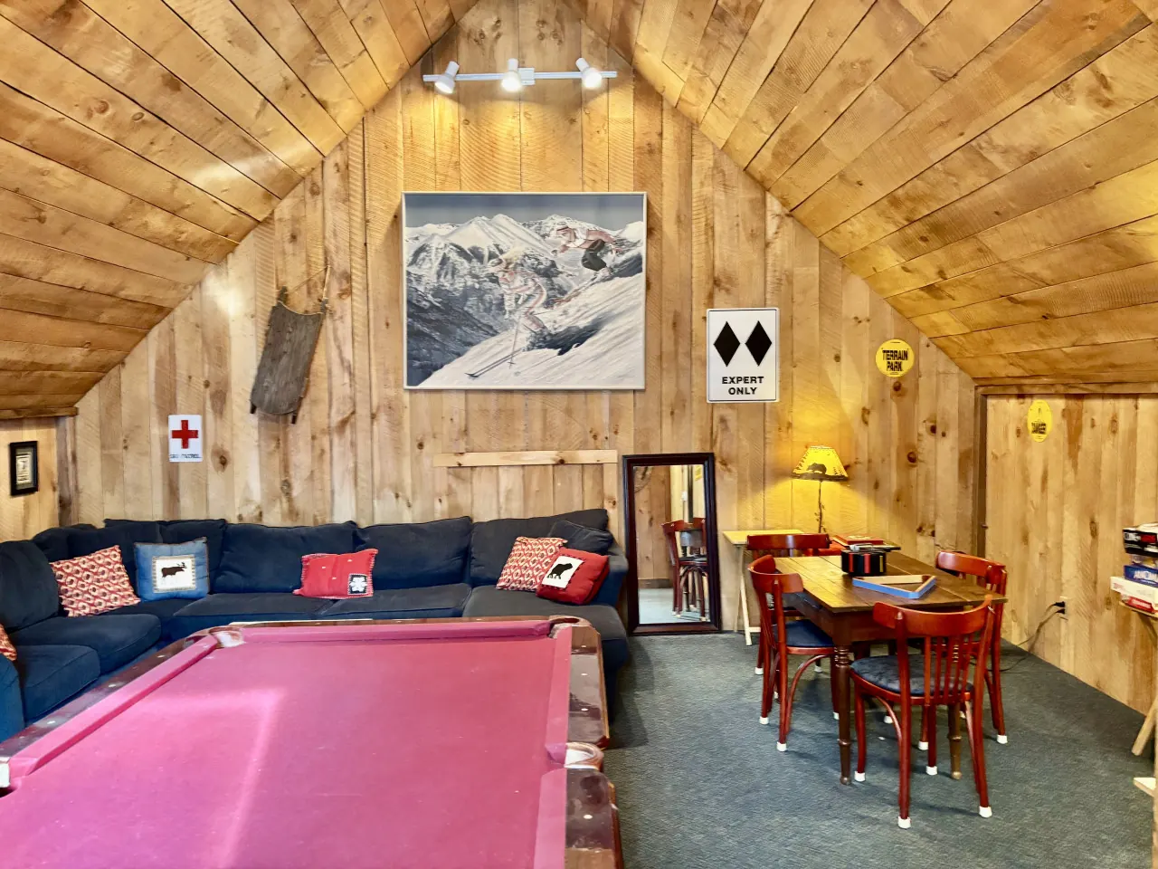 Game room with pool table, sofas, and gaming table