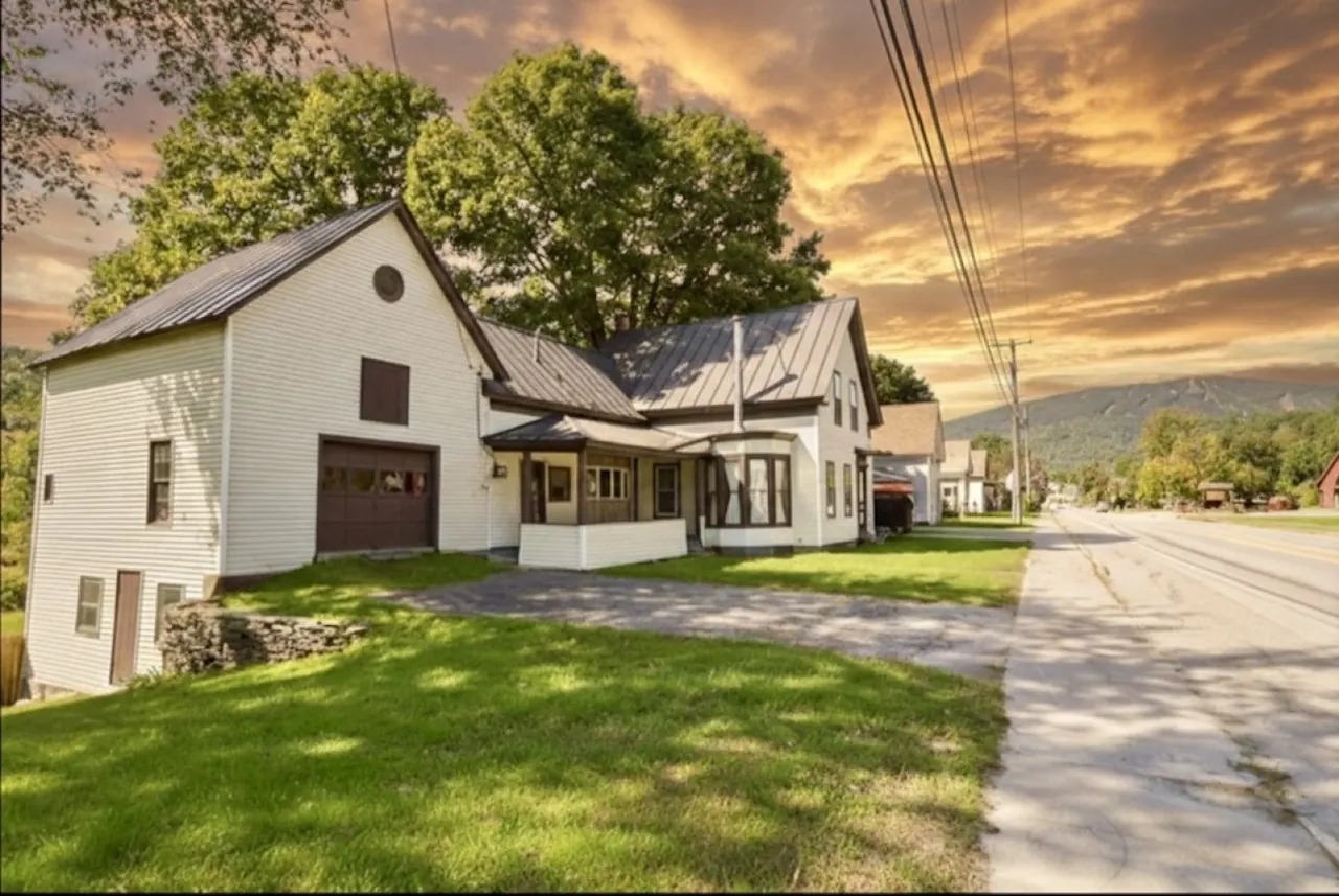 The Bear's Den and driveway on Main Street in downtown Ludlow, Vermont